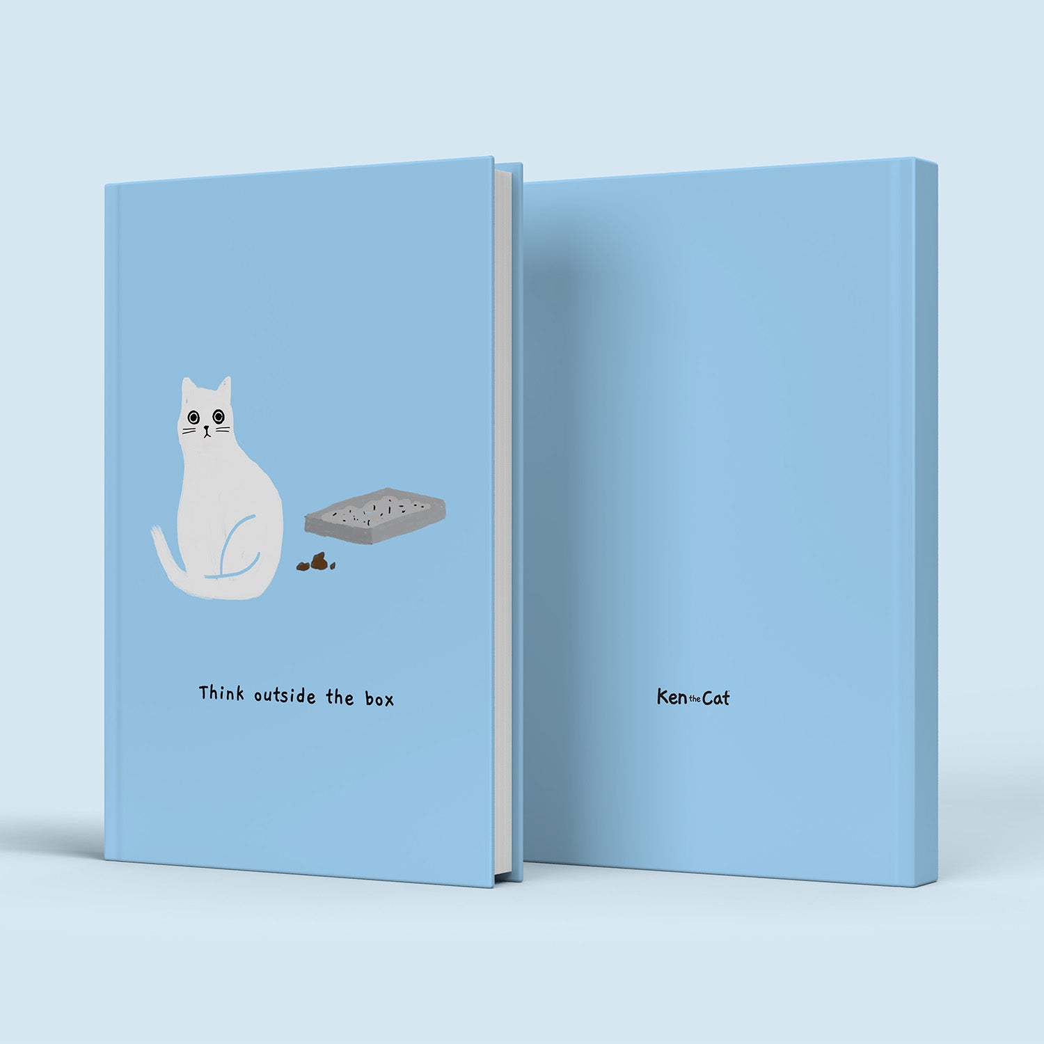 Ken the Cat think outside the box with litter tray blue A5 hardback journal front and back